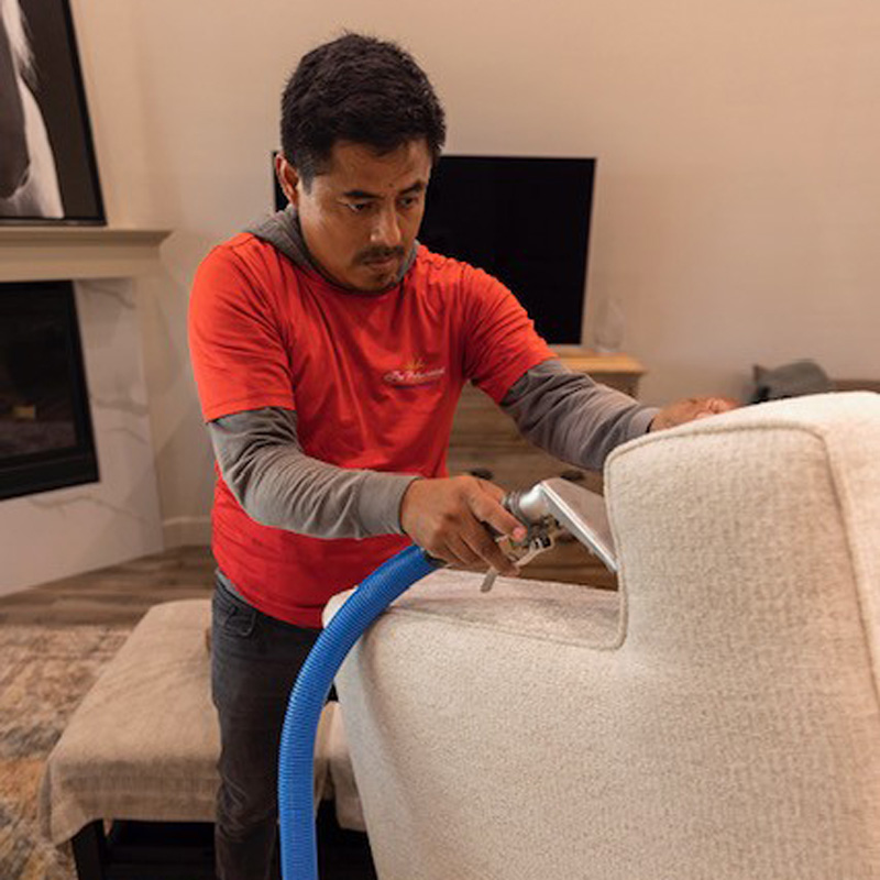 A professional is performing a residential disinfection process in Phoenix, AZ