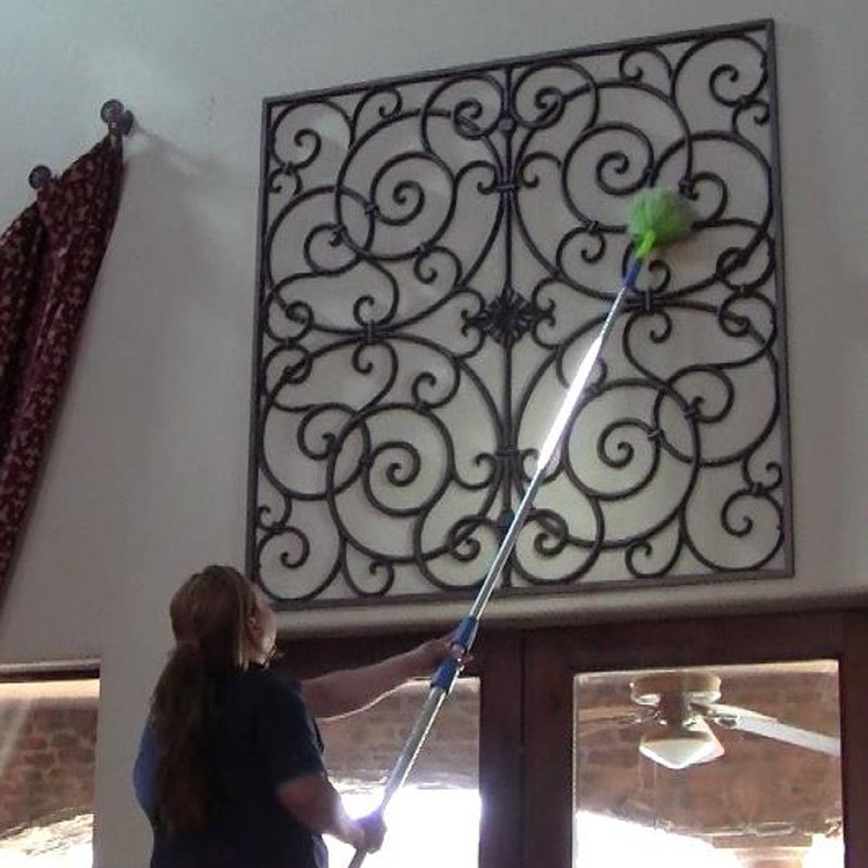 Professional cleaner in action during house cleaning in Phoenix, AZ